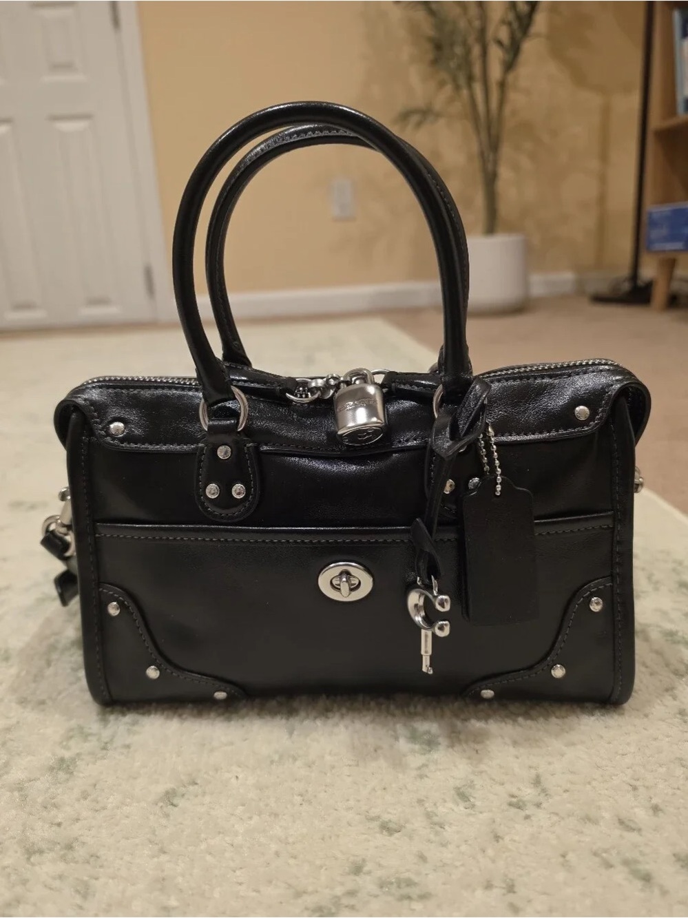 Coach Black Leather Satchel with Silver Hardware and Key Charm